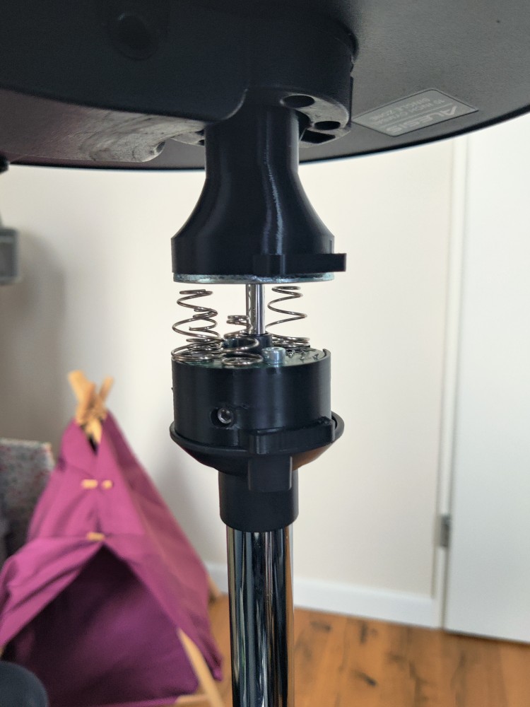 Underside view of mounted cymbal